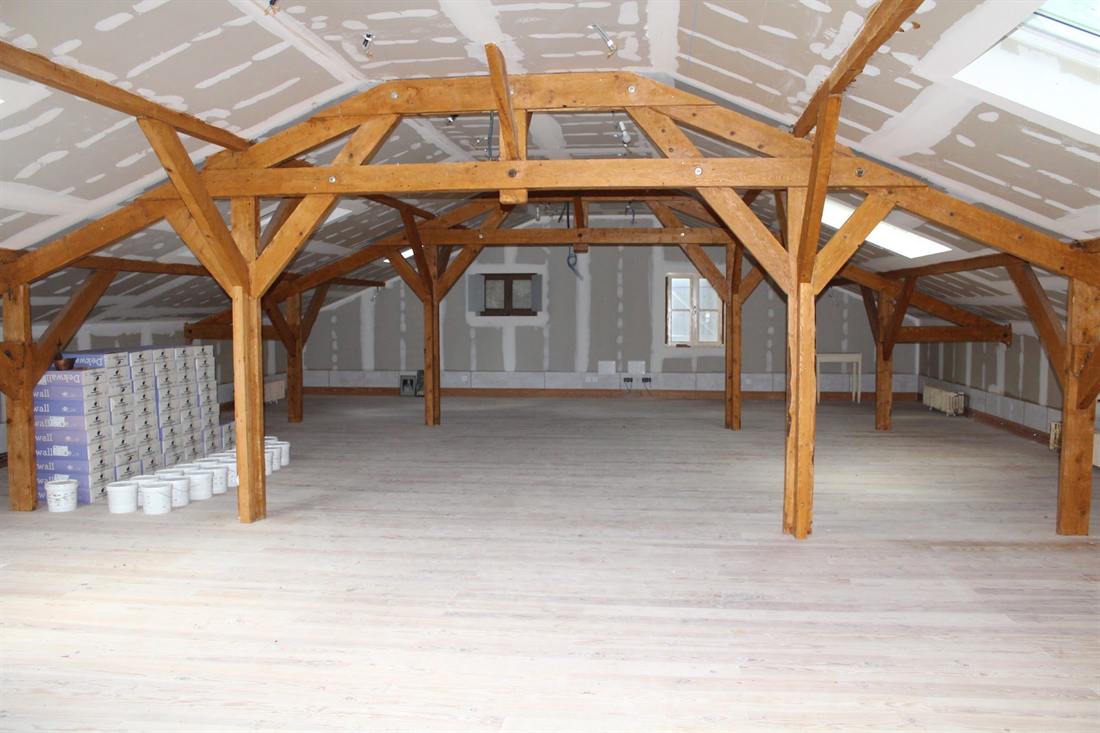 The great hall under its restored roof frame